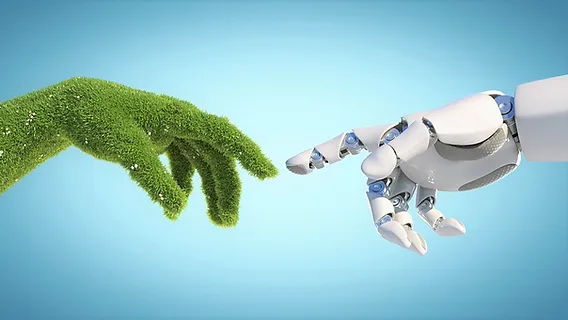 Imagem de duas mãos tocando as pontas dos dedos indicadores, sendo uma mão robótica e outra humana representando O que são tecnologias verdes?